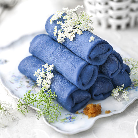Blue Crepe Stuffed with Palm Sugar and Freshly Grated Coconut Infusion