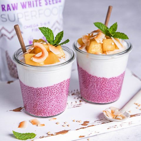Tropical Pink Pitaya Chia Seeds Pudding Topped with Toasted Coconut Chips